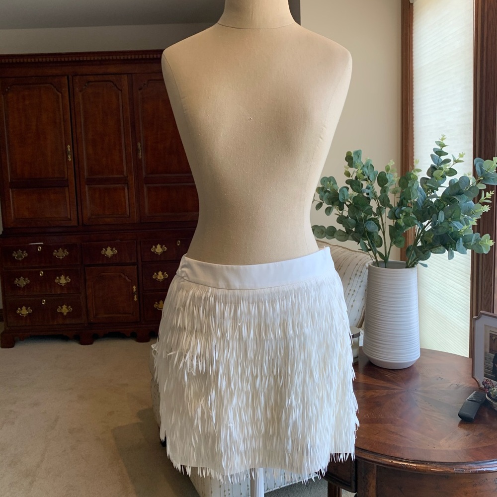 NEW. Express Fringe Mini Skirt. Color is white